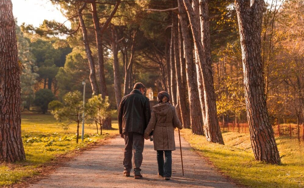 elderly couple walking