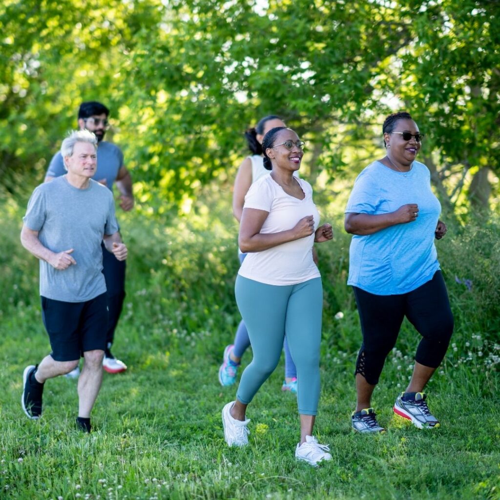 Group of middle-aged and advanced-age people walking outdoors