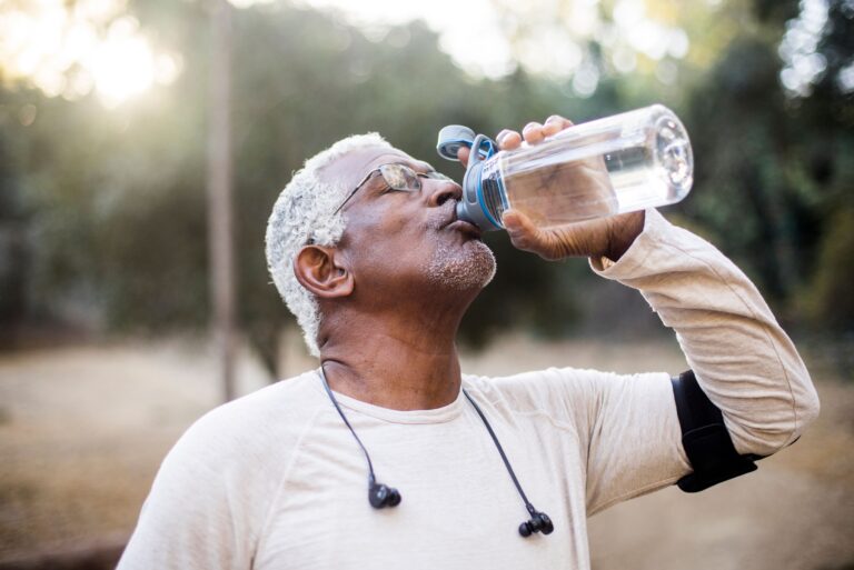 senior man drinking water