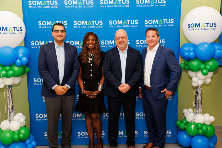 Somatus leaders participate in a ribbon-cutting ceremony for the company's new state-of-the-art Home Dialysis Training Center in Maryland, which will begin serving patients this fall. From left to right: Dr. Bassem Mikhael, Chief Medical Officer; Paula Moore, MSHA, MAEd, Senior Vice President of Dialysis Operations & Clinical Services; Jason Cline, Executive Vice President of Transformation and Acting Chief Financial Officer; and Adam Purks, Senior Vice President of Business Development. 