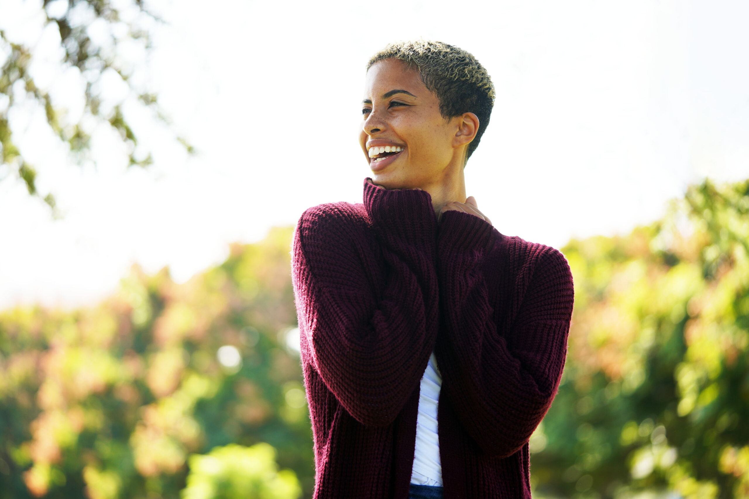 Beautiful,Young,Multicultural,Woman,Wears,A,Burgundy,Red,Sweater,And