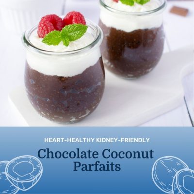 Two chocolate coconut parfaits sitting on table with whipped topping and raspberry on top